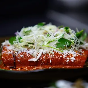 Enchiladas Rojas with chicken tinga.