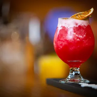 Red Apple Sour with overholt rye, whiskey, apple liqueur, pomegranate &amp; lime juice, dulce de cana