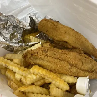 Choice of 2: Catfish + Flounder with Fries, Corn, and Hushpuppies!