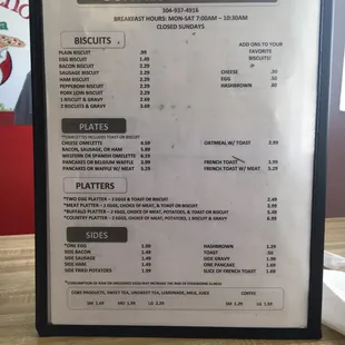 Breakfast menu, with hours and phone number.