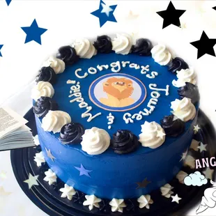 a birthday cake with a teddy bear on it