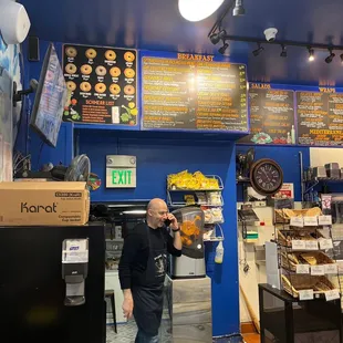 a man standing in front of the counter