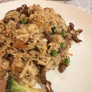 a plate of rice and vegetables