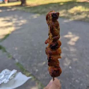 Barbecue pork skewer, $1