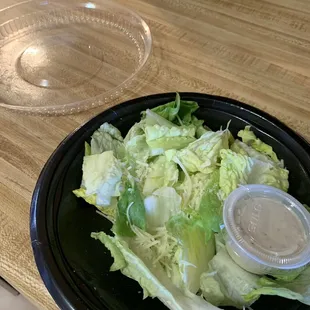 Wilted lettuce and dried up cheese