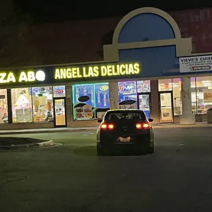 a car parked in front of it