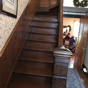 Stairs going to the upstairs rooms.