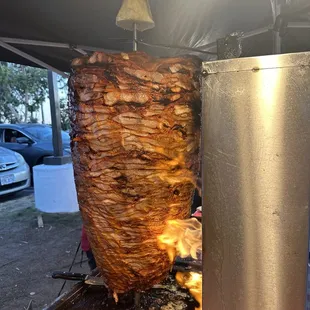 a skewer being cooked