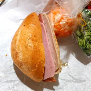 Combo baguette - size small $3.50 (Apr 2022). Good amount of deli meat, lots of mayo and pate!