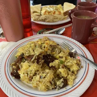 The large "mess." Eggs, shredded hash browns, onion, peppers, your choice of cheese and your choice of meat or no meat.
