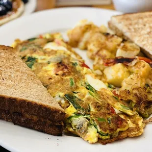 an omelet and a slice of bread