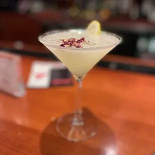a cocktail in a martini glass