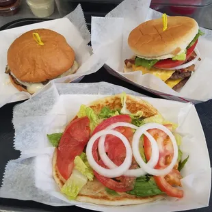 three burgers on a tray