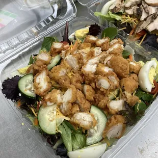 a salad in a plastic container