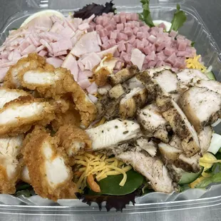 a salad in a plastic container