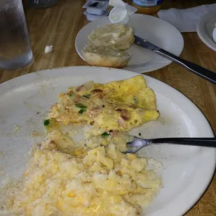 Western omelet with chees grits and homemade biscuit