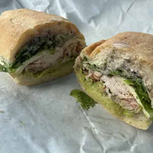 Sandwich of the week 4/5  Smoked turkey, ham, havarti, red onion, avocado, mixed greens and a house vinaigrette.