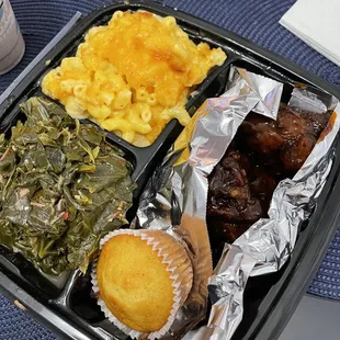 Jerk wings collard greens Mac and cheese corn bread spaghetti