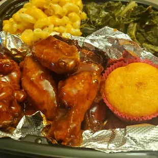 Jerk Chicken with Mac &amp; cheese, Greens and Corn bread
