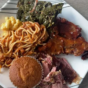 Turkey leg, ribs, corn bread, spaghetti Mac &amp; cheese, &amp; collard greens.