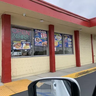 a view of the outside of a restaurant