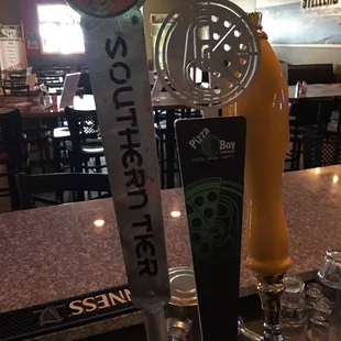 a beer tap and a beer glass