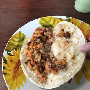 Papas con chorizo and beans