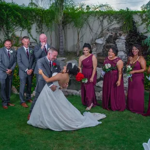 Bride &amp; Groom in front of turtle pond/waterfall