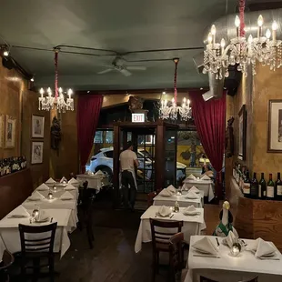 a dining room with a chandelier