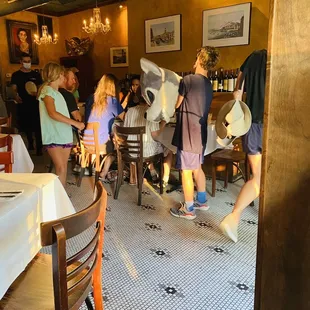 a group of people in a restaurant