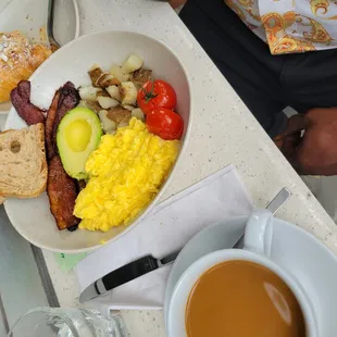 Angelina&apos;s breakfast  with a almond croissant  and coffee