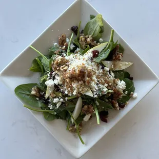 Spinach, Pear &amp; Goat Cheese Salad* | Fresh pear, dried cranberries, candied walnuts &amp; balsamic vinaigrette.