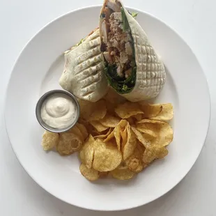 Buffalo Chicken Wrap | Breaded chicken breast with buffalo sauce &amp; house made bleu cheese dressing.