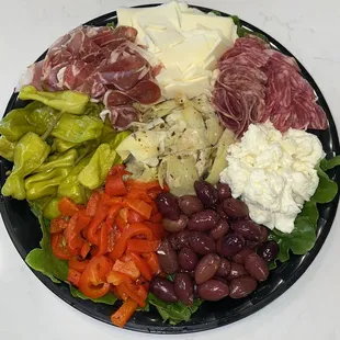 Catering Size | Antipasto Platter | A beautiful display of Italian meats and cheeses, roasted sweet peppers, olives &amp; artichoke hearts.