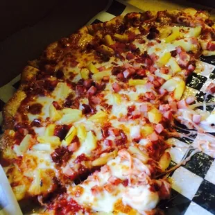 Raw dough and extremely greasy Hawaiian large pizza