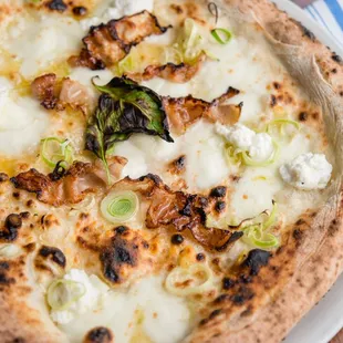 Formaggio e Porri; Ricotta cheese, leeks, guanciale, Parmigiano-Reggiano, mozzarella di bufala, basil, EVOO