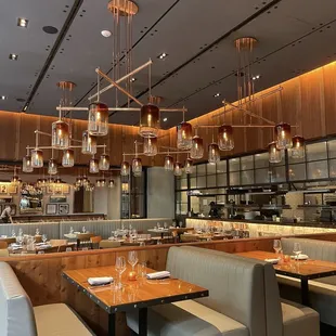 A large dining room, open kitchen, private dining area, and 360 bar (not pictured).