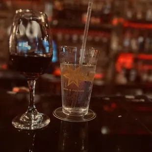 a glass of wine and a drink