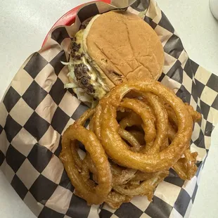 Single hamburger with onion rings