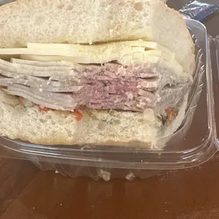 a sandwich in a plastic container