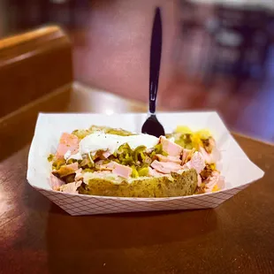 Smoked turkey studded baked potato with jalapeños!