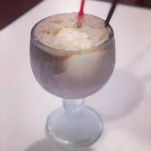 Ice cream soda floats served in frosty frozen schooners.