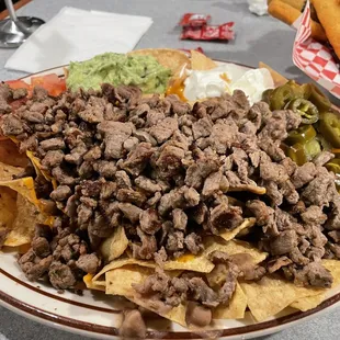 Asada nachos kinda salty