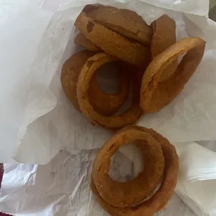 Onion rings not fully cooked.