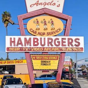 Not sure if the sign still light up at night. Rollerskate service only inside, no carhops.