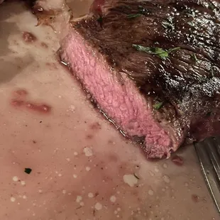 New York strip cooked medium