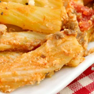 a plate of pasta and deli