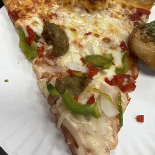 Round Slice Pizza with 3 Toppings; meatballs, onions, and green peppers.