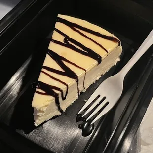 Fantastic Cheesecake w/ chocolate sauce togo!!!