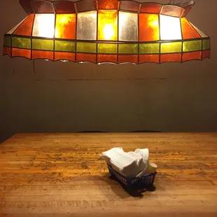 a wooden table with a paper towel on it